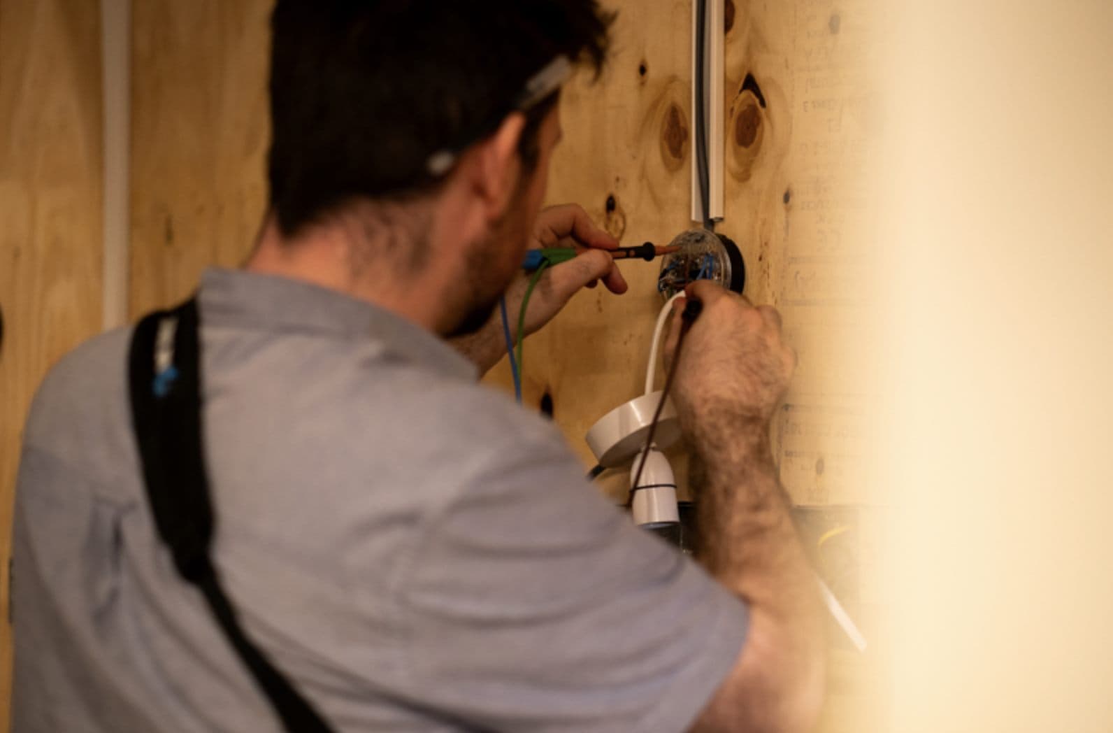 Electrician testing an installation