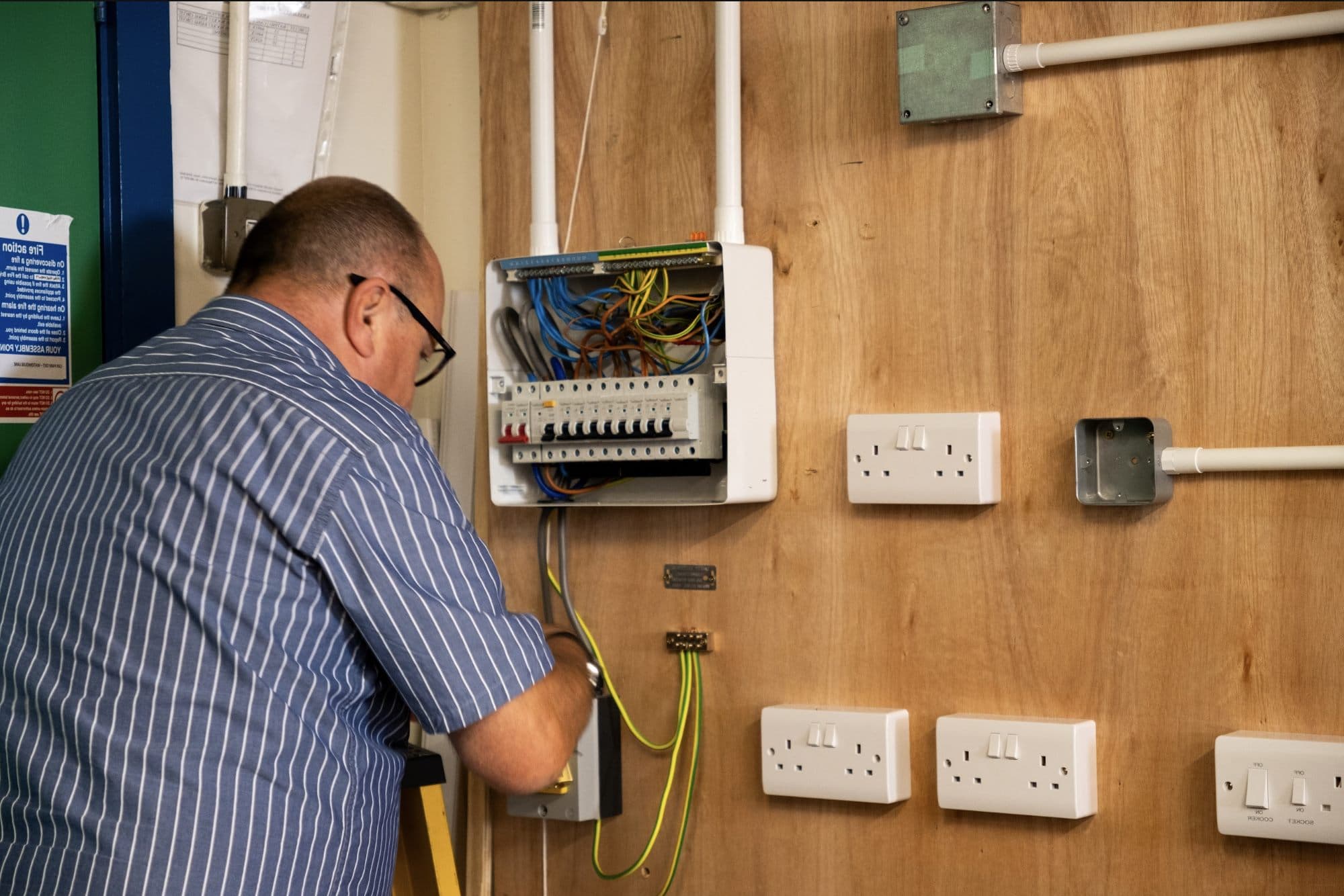 Electrician wiring a domestic installation